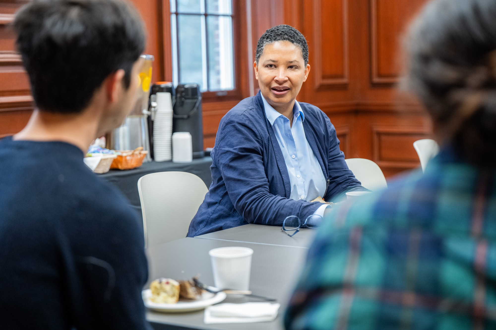 Danielle Allen discussing with students in a seminar.