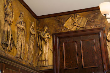 Detail of the frieze in Pembroke Hall 202